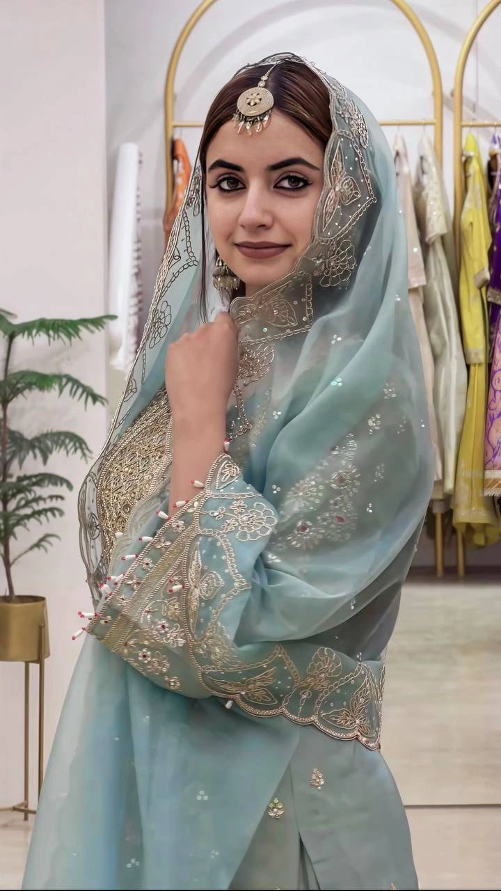 Sage Green Sequins Embroidered Sharara Suit model dupatta draped over head – Kalyanja KU305